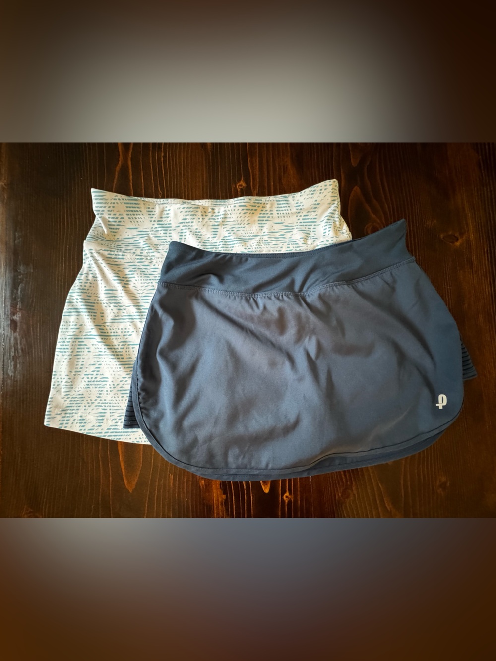 TWO tennis skirts small